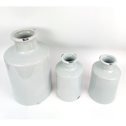 10 - A COLLECTION OF BOTTLE VASES, three celedon with craquelure glaze and two powder blue. (5)