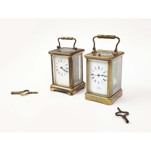 18 - TWO CARRIAGE CLOCKS, compromising a dent repeater carriage clock, striking on a gong, together with ... 