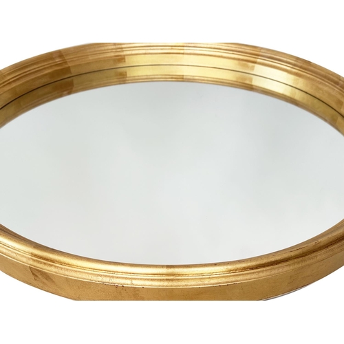 405 - WALL MIRROR, large circular leaf gilded giltwood, 102cm W.