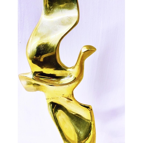 347 - CONTEMPORARY SCHOOL FLYING BIRD SCULPTURE, gilt metal on a black base, 55cm H