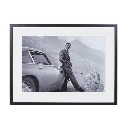 349 - PHOTOPRINT, James Bond and his Aston Martin in black and white, framed, 63cm H x 83cm.