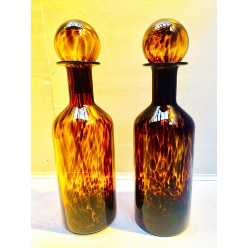 351 - DECANTERS, a pair, Murano style tortoiseshell style glass, 53cm H x 14cm. (2)