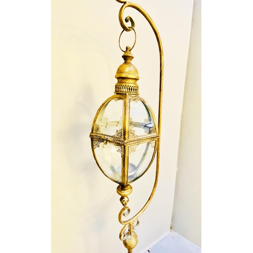 354 - FLOOR STANDING LANTERNS, a pair, gilt metal with stands, 120cm H x 36cm. (2)