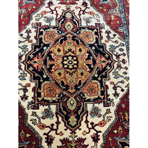 160 - PERSIAN HERIZ RUG, 215CM X 155CM.