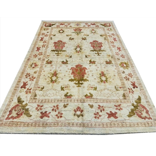 169 - FINE ARTS AND CRAFTS DESIGN OUSHAK CARPET, 243cm x 175cm.