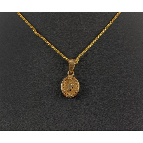 21 - AN OVAL SAPPHIRE AND DIAMOND PENDANT, silver-gilt chain, together with a matching pair of sapphire a... 