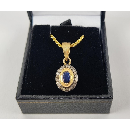 21 - AN OVAL SAPPHIRE AND DIAMOND PENDANT, silver-gilt chain, together with a matching pair of sapphire a... 