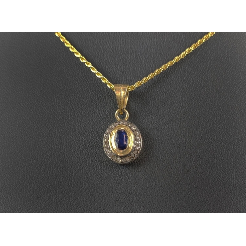 21 - AN OVAL SAPPHIRE AND DIAMOND PENDANT, silver-gilt chain, together with a matching pair of sapphire a... 