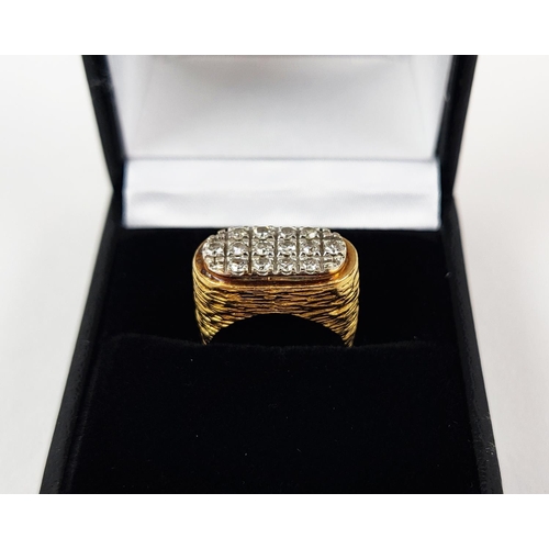 22 - A YELLOW METAL AND DIAMOND SET DRESS RING, set with three rows of round brilliant cut diamonds, rust... 