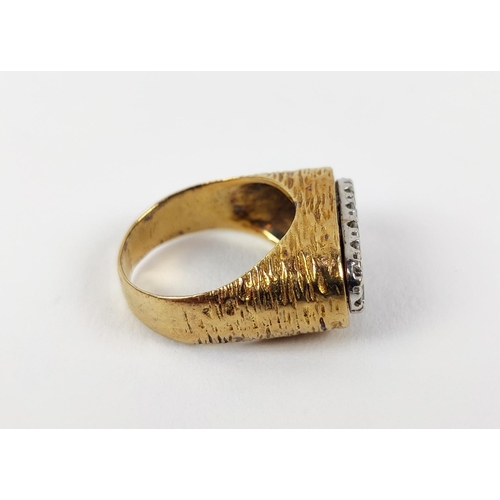 22 - A YELLOW METAL AND DIAMOND SET DRESS RING, set with three rows of round brilliant cut diamonds, rust... 