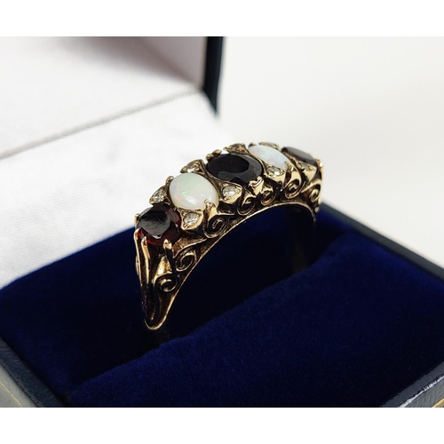 37 - A VICTORIAN STYLE GARNET AND OPAL DRESS RING, 9ct gold shank, set with three oval cut garnets, inter... 