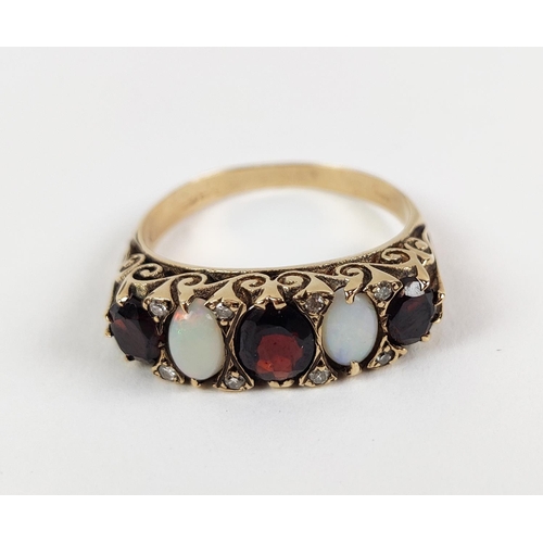 37 - A VICTORIAN STYLE GARNET AND OPAL DRESS RING, 9ct gold shank, set with three oval cut garnets, inter... 