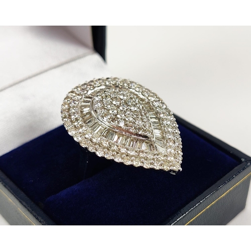 38 - A DIAMOND ENCRUSTED PEAR SHAPED DRESS RING, 9ct white gold shank, set with round brilliant and bague... 