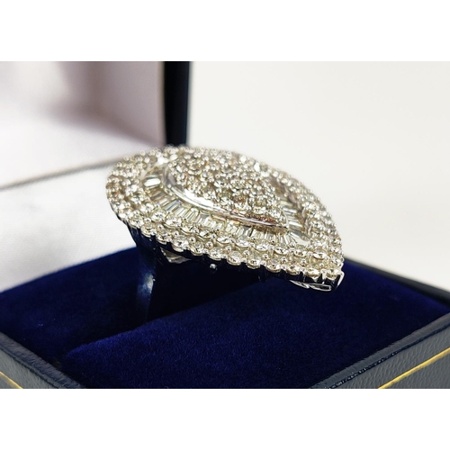 38 - A DIAMOND ENCRUSTED PEAR SHAPED DRESS RING, 9ct white gold shank, set with round brilliant and bague... 