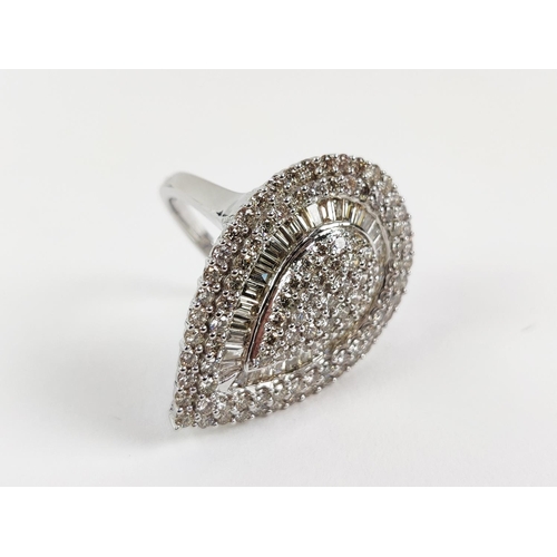 38 - A DIAMOND ENCRUSTED PEAR SHAPED DRESS RING, 9ct white gold shank, set with round brilliant and bague... 