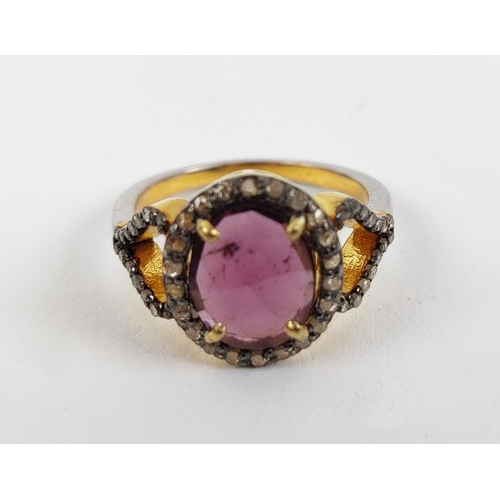 40 - A GEORGIAN STYLE RHODOLITE GARNET AND DIAMOND SET DRESS RING, gilt metal shank, the rose cut garnet ... 