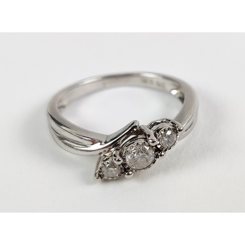 35A - A COLLECTION OF JEWELLERY, comprising a 9ct white gold diamond trilogy ring, the central stone of ap... 