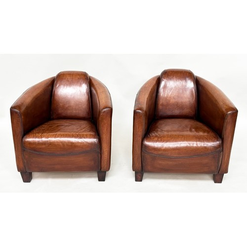 111 - AVIATOR ARMCHAIRS, a pair, compact proportions hand-finished antique tan brown leather upholstered, ... 