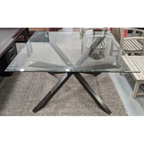 321 - DINING TABLE, beveled glass top, ebonised base, 140cm x 140cm x 76cm.