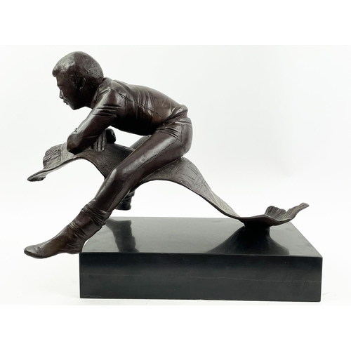 4 - BRONZE BOY ON CARPET, manner of Patrick Comerford, signed D.B. and numbered 1/10 86, 40cm H x 45cm L... 