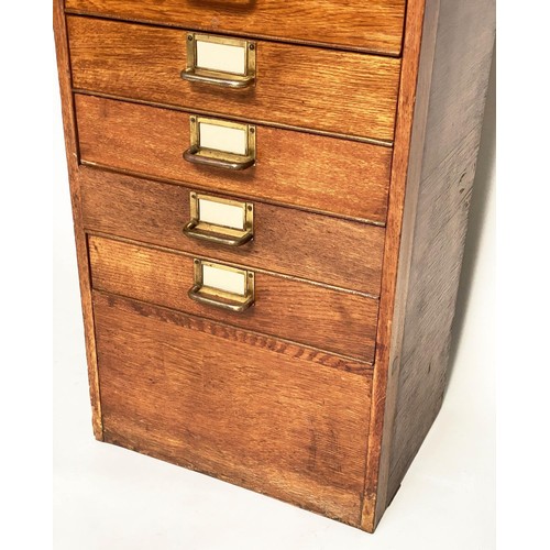 99 - FILING CHEST, mid 20th century oak with eighteen drawers and brass labels/handles, stamped 'ER' Gove... 