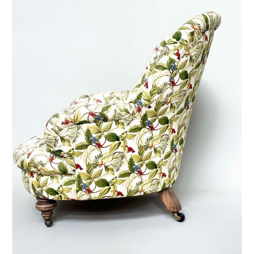 104 - ARMCHAIR, Victorian with deep buttoned botanical print upholstery and turned front supports.