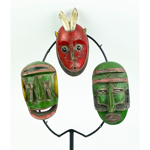 12 - BETE MASKS, a set of three, Ivory Coast, 47cm H. (3)