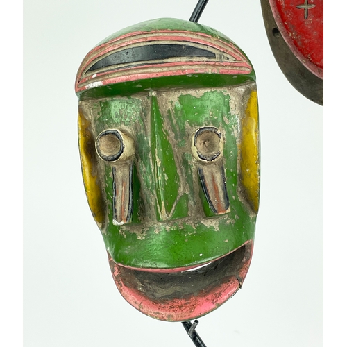 12 - BETE MASKS, a set of three, Ivory Coast, 47cm H. (3)