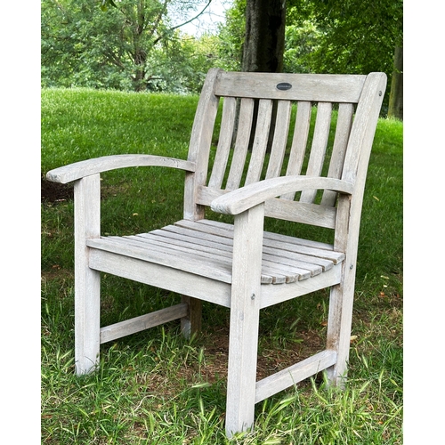 135 - GARDEN ARMCHAIRS, a pair, well weathered teak slatted with curved arms, 75cm H x 78cm W, together wi... 