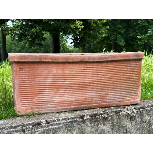 136 - GARDEN TERRACOTTA PLANTERS, a pair, rectangular well weathered terracotta with ribbed side panels, 8... 