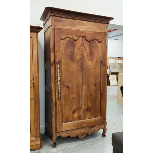 145 - ARMOIRE, late 18th/early 19th century French fruitwood with a panelled door, shelf and chrome hangin... 