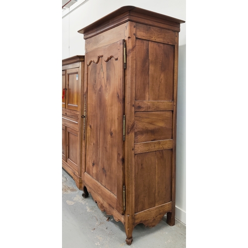 145 - ARMOIRE, late 18th/early 19th century French fruitwood with a panelled door, shelf and chrome hangin... 