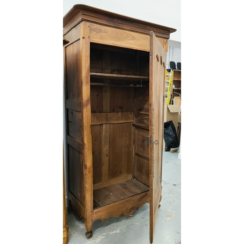 145 - ARMOIRE, late 18th/early 19th century French fruitwood with a panelled door, shelf and chrome hangin... 