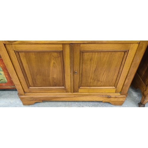 146 - CABINET, 19th century French fruitwood with two pairs of panelled doors and drop front compartment, ... 