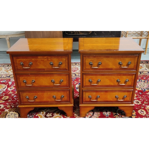 147 - BEDSIDE CHESTS, a pair, yewwood, each with three drawers, 51cm W x 39cm D x 67cm H. (2)