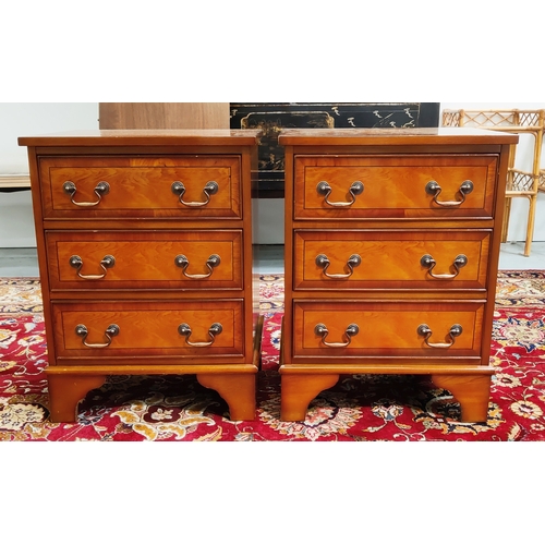 147 - BEDSIDE CHESTS, a pair, yewwood, each with three drawers, 51cm W x 39cm D x 67cm H. (2)