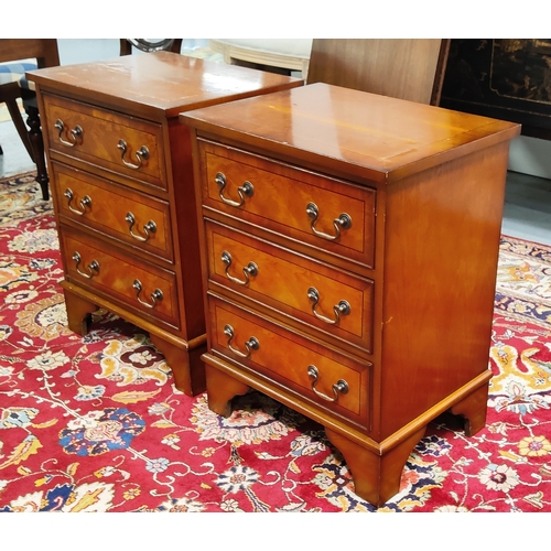 147 - BEDSIDE CHESTS, a pair, yewwood, each with three drawers, 51cm W x 39cm D x 67cm H. (2)