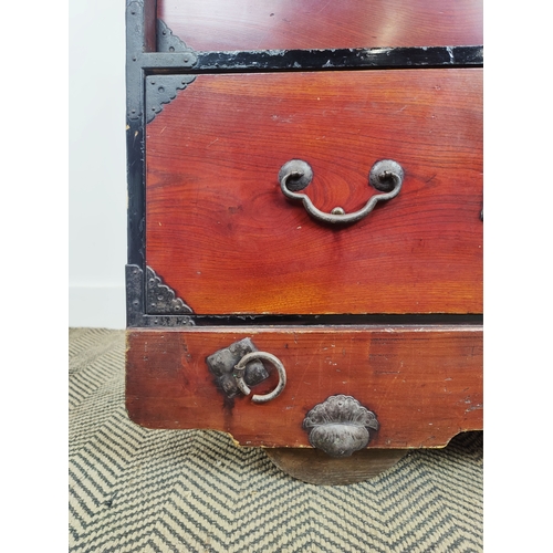 149 - JAPANESE CHEST, 19th century elm, firwood and iron mounted, with nine drawers and a door on large wo... 