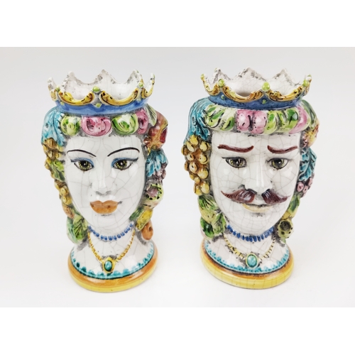 18 - SICILIAN CERAMIC HEAD VASES, a pair, a lady and a gentleman, with hanging fruit embellishments, 26cm... 