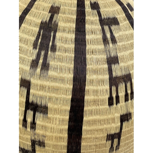 25 - COLOMBIAN WERREGUE WOVEN PALM VASE,  55cm H.