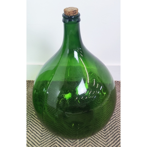 419 - DEMI JOHN BOTTLES, a set of three , green glass, largest 69cm H x 44cm W. (3)