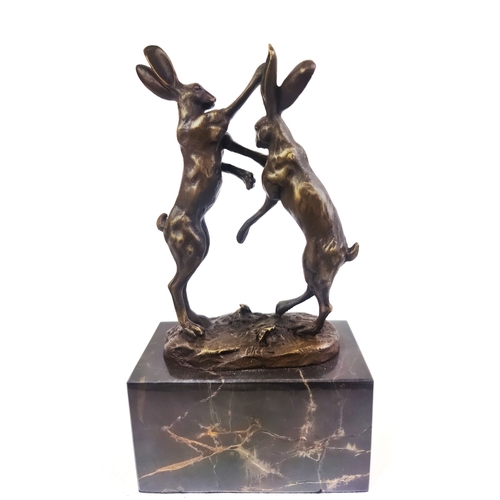 432 - CONTEMPORARY SCHOOL BOXING HARES, cast metal, on marble base, 26cm H.