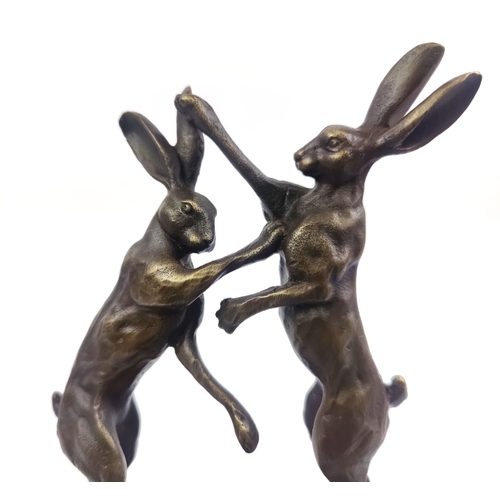 432 - CONTEMPORARY SCHOOL BOXING HARES, cast metal, on marble base, 26cm H.