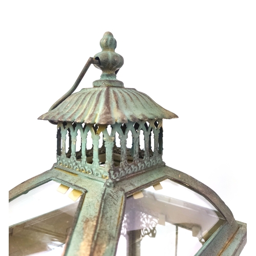 437 - LANTERNS, a pair, faux verdigris finish metal and glass, 55cm H x 26cm W x 17cm D. (2)