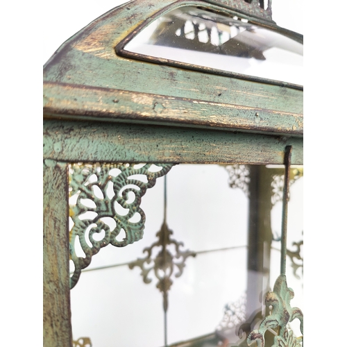 437 - LANTERNS, a pair, faux verdigris finish metal and glass, 55cm H x 26cm W x 17cm D. (2)