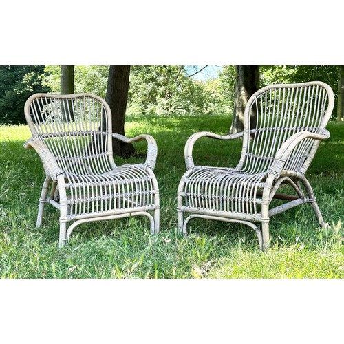 133 - CONSERVATORY ARMCHAIRS, a pair, 1930s weathered rattan and cane bound, 69cm W. (2)