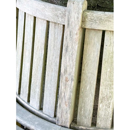 139 - GARDEN TREE BENCH, nicely weathered teak forming half round (two quadrants) of slatted form with upr... 