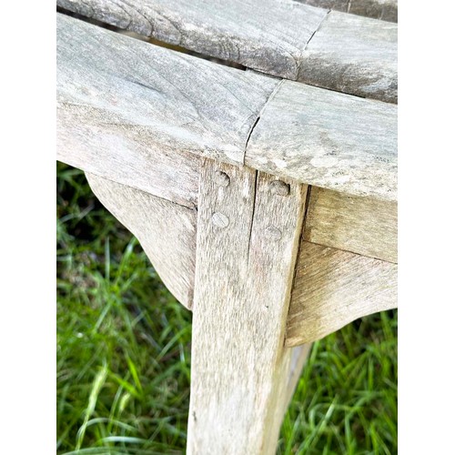 139 - GARDEN TREE BENCH, nicely weathered teak forming half round (two quadrants) of slatted form with upr... 