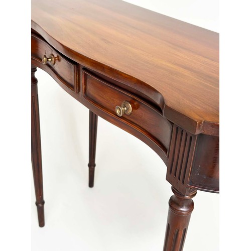 107 - HALL TABLE, George III design mahogany of serpentine outline with three frieze drawers and tapering ... 