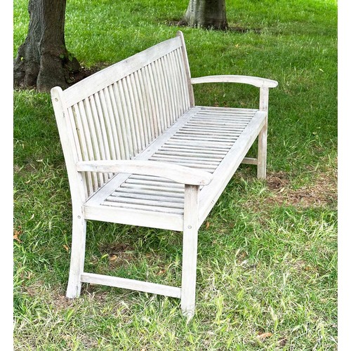 137 - GARDEN BENCH, well weathered teak slatted with slightly arched arms, 165cm W.